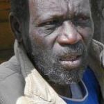 Un africano desempleado en el suburbio industrial de Sinaiyya