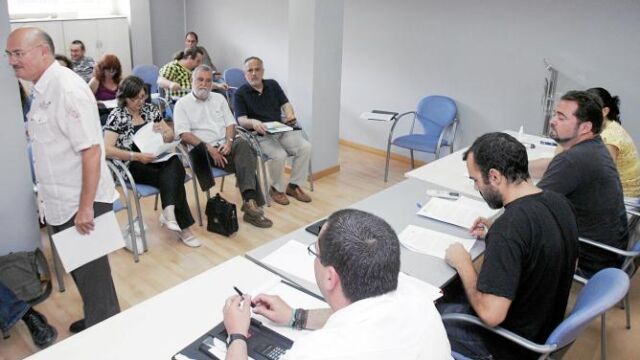 Medrano, Torrijos y García, sentados en primera fila