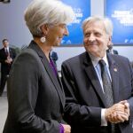Christine Lagarde, presidenta del FMI, charla con Jean Claude Trichet que, desde su posición de presidente del BCE, ha pedido la creación de un Ministerio de Finanzas europeo