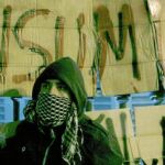 Un manifestante, con el rostro cubierto, durante una protesta reciente