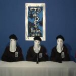 Imagen de los tres encapuchados que han hecho público el comunicado
