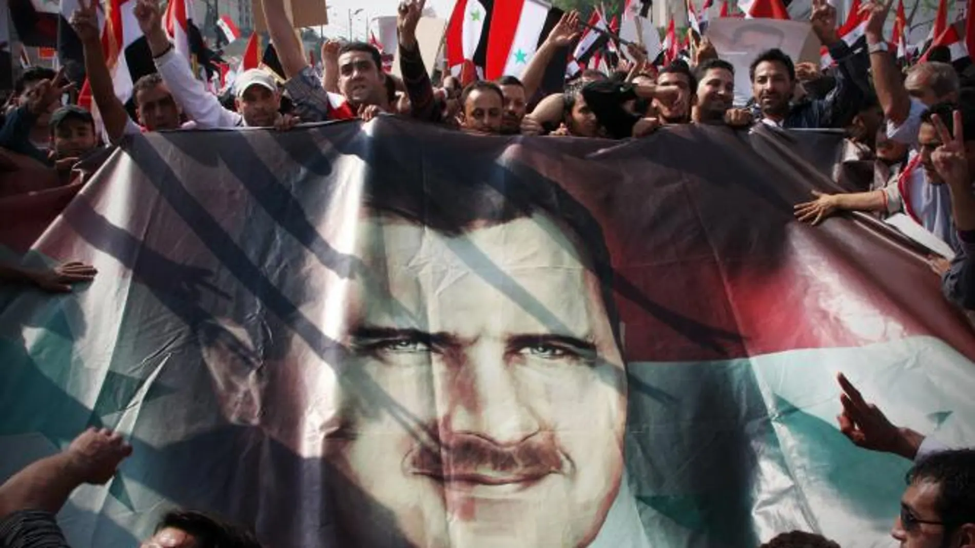 Retrato de Bachar al Asad en una manifestación en favor del régimen sirio
