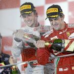 ALONSO, al lado de Button en el podio de Singapur
