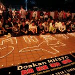 Homenaje a los pasajeros del vuelo MH370 de Malaysia Airlines, en Kuala Lumpur, el 7 de abril de 2014
