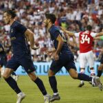 Asensio celebra el gol que marcó al Arsenal con Gareth Bale