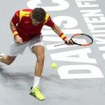 Carreño no llega a una bola ante Pella