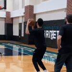 Ricky Rubio y Devin Book / Twitter
