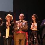 El presidente de la Diputación de Alicante, Carlos Mazón (d) no aplaude el discurso pronunciado por el presidente de la Generalitat Valenciana, Ximo Puig