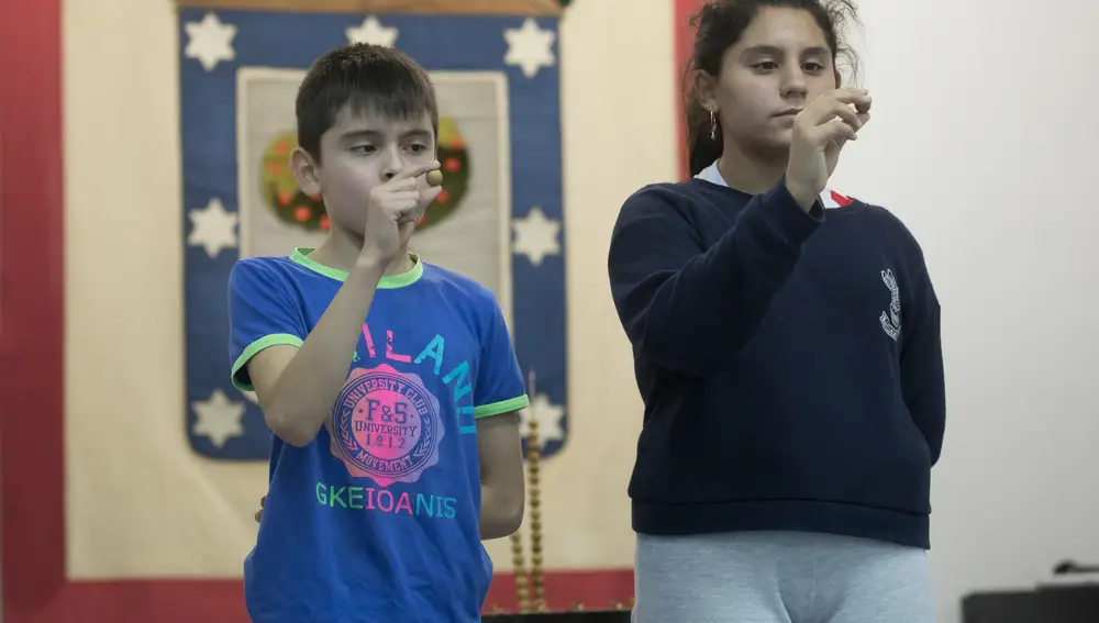 Alumnos del colegio San Ildefonso durante un ensayo antes del sorteo de la lotería de Navidad de diciembre de 2019