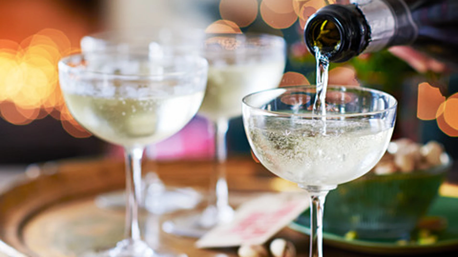 Champagne being poured into glasses Action Being Celebrated Being Poured In Being Served Beverage Blur Blurred Celebrate Celebrating Celebration Celebrations Champagne Champagne Glass Champers Christmas Christmas Dish Copy Space Crockery Dishware Drink Europe Festive Food And Drink France Function Functions Glass Holiday Indoors Inside Occasion Out Of Focus Parties Party Pour In Pouring In Sekt Series Serve Serving Soft Focus Somebody Someone Sparkling Wine Sparkling Wine Glass Studio Shot Tableware Unfocused West Europe Western Europe Wine Wooden Tray Xmas Yuletide