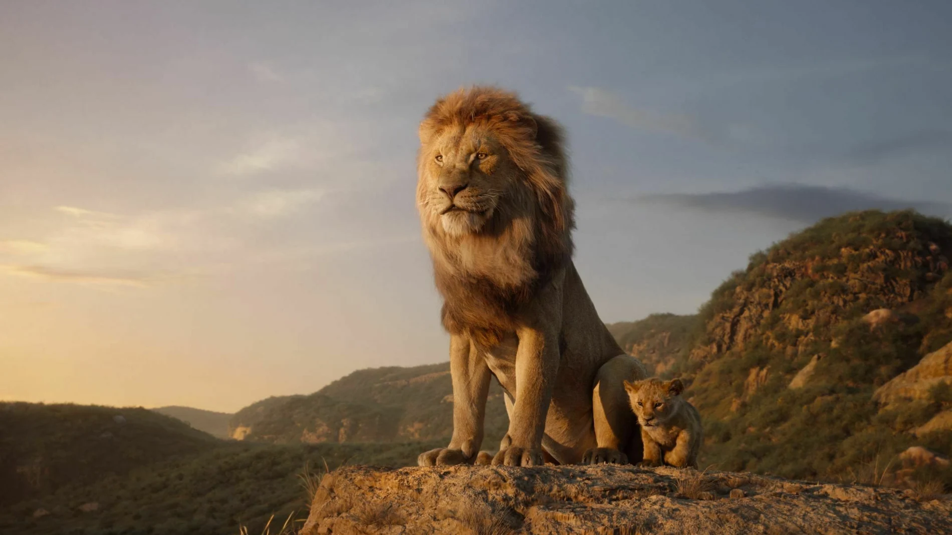 This image released by Disney shows characters, from left, Mufasa, voiced by James Earl Jones, and young Simba, voiced by JD McCrary, in a scene from "The Lion King." (Disney via AP)