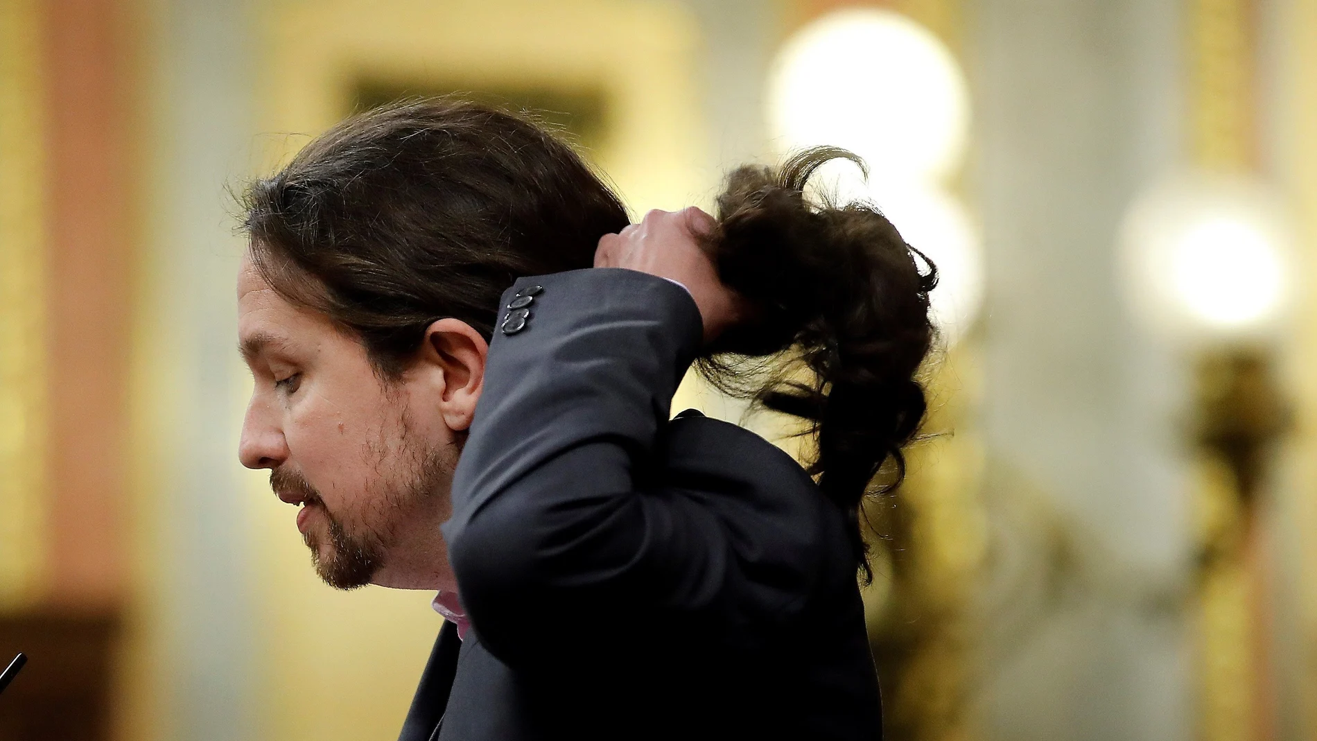 El líder de Unidas Podemos, Pablo Iglesias, durante su intervención ante el pleno del Congreso de los Diputados en la primera jornada de la sesión de investidura de Pedro Sánchez como presidente del Gobierno
