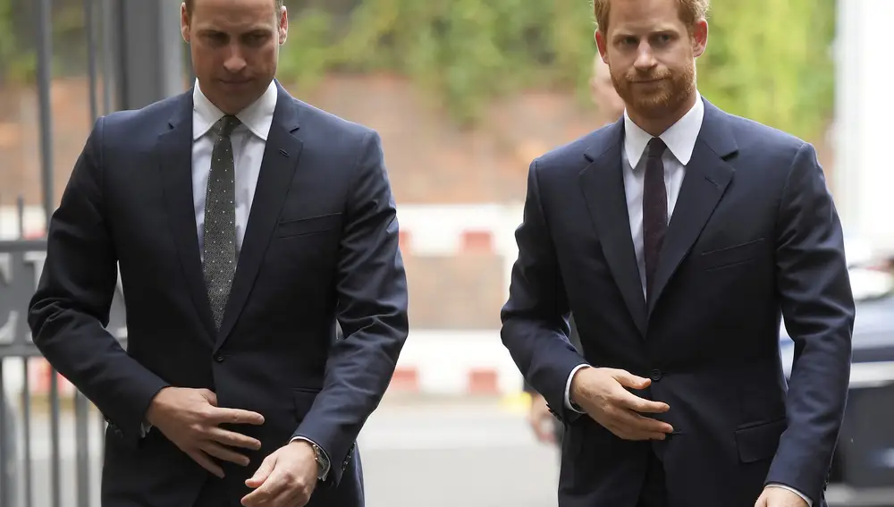 FILE - In this Tuesday, Sept. 5, 2017 file photo, Britain's Prince William, the Duke of Cambridge, left, and Prince Harry arrive to visit the Support4Grenfell Community Hub in London. Britain's Queen Elizabeth II is set to hold face-to-face talks Monday, Jan. 13, 2020 with Prince Harry for the first time since he and his wife, Meghan, unveiled their controversial plan to walk away from royal roles — at a dramatic family summit meant to chart a future course for the couple. The meeting at the monarch's private Sandringham estate in eastern England will also include Harry's father Prince Charles and his brother Prince William. (Toby Melville/ Pool via AP, File)