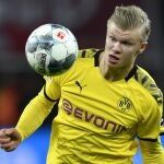 Dortmund's Erling Braut Haaland controls the ball during the German Bundesliga soccer match between Bayer Leverkusen and Borussia Dortmund in Leverkusen, Germany, Saturday, Feb. 8, 2020. (AP Photo/Martin Meissner)