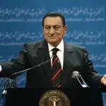 FILE - In this Nov. 1, 2008 file photo, Egyptian President Hosni Mubarak delivers a speech at the first day of the 5th annual convention of the ruling National Democratic Party in Cairo, Egypt. Egypt's state TV said Tuesday, Feb. 25, 2020, that the country's former President Hosni Mubarak, ousted in the 2011 Arab Spring uprising, has died at 91. Mubarak, who was in power for almost three decades, was forced to resign on Feb. 11, 2011, after following 18 days of protests around the country. The Arab Spring uprisings had convulsed autocratic regimes across the Middle East. (AP Photo/Nasser Nasser, File)