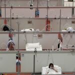 Vista del pabellón 9 del Hospital de campaña de Ifema, este jueves durante la vigésima sexta jornada del Estado de Alarma decretado por el Gobierno para frenar la pandemia del coronavirus. EFE/Ballesteros.