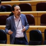GRAF3648. MADRID, 21/04/2020.- El ministro de Derechos Sociales y Agenda 2030 y vicepresidente segundo del Gobierno, Pablo Iglesias, durante la primera sesión de control al Ejecutivo que este martes acoge el Senado durante el estado de alarma, con un presencia reducida al 10 por ciento de los senadores para así mantener las medidas de prevención frente al coronavirus. EFE/ Chema Moya / POOL