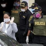 Former Peruvian presidential candidate Keiko Fujimori waves to the press after she was released from prison in Lima, Peru, Monday, May 4, 2020. Fujimori who is the daughter of jailed former president Alberto Fujimori will be released while she is under investigation for money laundering, after Peru's supreme court accepted an appeal and ruled to revoke Fujimori's 15-month jail sentence. (AP Photo/Martin Mejia