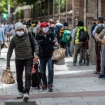 Colas en un comedor social de Madrid