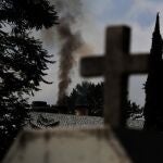 Smoke rises from the crematorium at the PanteÃ³n de San Nicolas Tolentino cemetery in the Iztapalapa neighborhood of Mexico City, Tuesday, June 2, 2020. Funeral parlors and crematoriums in Iztapalapa, a borough of 2 million people, say they have seen their work multiplied with the surging number of dead of COVID-19 in the capital's hardest-hit corner by the new coronavirus. (AP Photo/Marco Ugarte)