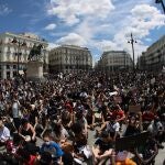 Manifestantes en la Puerta del Sol durante la concentración