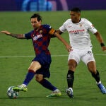Diego Carlos con Messi.