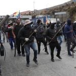 Demonstrators form up during a protest against the postponement of the presidential election, in El Alto, Bolivia, Tuesday, Aug. 11, 2020. Citing the ongoing new coronavirus pandemic, Bolivia's highest electoral authority delayed presidential elections from Sept. 6 to Oct. 18, the third time the vote has been delayed. (AP Photo/Juan Karita)