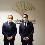 El director Territorial de Málaga de Unicaja Banco, Agustín Sánchez López, y el consejero delegado de MEDAC, Miguel Reinoso Fernández-Caparrós