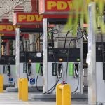 Closed gas pumps stand at a gas station in Caracas, Venezuela, Tuesday, Sept 8, 2020. Gasoline shortages have returned to Venezuela, sparking mile-long lines in the capital as international concerns mounted that Iran yet again may be trying to come to the South American nation's rescue. (AP Photo/Ariana Cubillos)