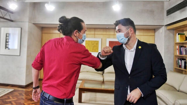 El vicepresidente segundo del Gobierno y líder de Unidas Podemos, Pablo Iglesias y el portavoz parlamentario de ERC, Gabriel Rufián