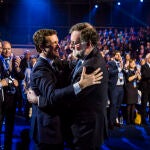 Mariano Rajoy y Pablo Casado, en la Convención Nacional del PP en 2019