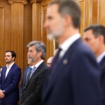 Irene Montero, titular de Igualdad, Alberto Garzón, ministro de Consumo, momentos antes de jurar o prometer ante el rey en el acto de toma de posesión, con el presidente del Gobierno, Pedro Sánchez presente, en el Palacio de la Zarzuela.