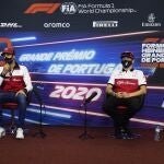 Alfa Romeo drivers Kimi Raikkonen of Finland and Antonio Giovinazzi of Italy attend a media conference prior to the Formula One Portuguese Grand Prix at the Algarve International Circuit in Portimao, Portugal, Thursday, Oct. 22, 2020. The Formula One Portuguese Grand Prix will take place on Sunday. (Rudy Carezzevoli, Pool via AP)