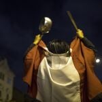 A pro-government protester hits a pot during a protest near the Congress in Lima, Peru, Monday, Nov. 9, 2020. (AP Photo/Rodrigo Abd)