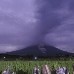 Volcanic materials spew from the crater of Mount Semeru in Lumajang, East Java, Indonesia, Tuesday, Dec. 1, 2020. Indonesian authorities are closely monitoring several volcanoes after sensors picked up increased activity in recent weeks, prompting the evacuation of thousands of people. (AP Photo)