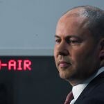 Australian Treasurer Josh Frydenberg speaks to the media during a press conference at Parliament House in Canberra, Tuesday, Dec. 8, 2020. Australiaâ€™s government will reveal legislation in Parliament on Wednesday that would make Facebook and Google pay for journalism. (Lukas Coch/AAP Image via AP)