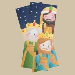 Muestra de los marcapáginas con los tres Reyes Magos blancos que han recibido los vecinos del distrito de Moncloa-Aravaca estas Navidades.