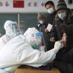 China confina otra ciudad para evitar la propagación de la Covid