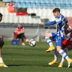 Samu Costa con el Almería y Borja Sainz con el Deportivo Alavés.