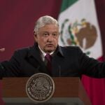 FILE - In this Dec. 18, 2020 file photo, Mexican President Andres Manuel Lopez Obrador gives his daily, morning news conference at the presidential palace, Palacio Nacional, in Mexico City. Mexico President AndrÃ©s Manuel LÃ³pez Obrador says he has tested positive for COVID-19 and is under medical treatment, Sunday, Jan. 24, 2021. (AP Photo/Marco Ugarte, File)