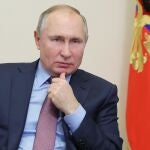 Russian President Vladimir Putin attends a meeting with the Government via video conference at the Novo-Ogaryovo residence outside Moscow, Russia, Wednesday, Feb. 10, 2021. (Mikhail Klimentyev, Sputnik, Kremlin Pool Photo via AP)