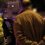Imagen del detenido, custodiado por la Policía Nacional