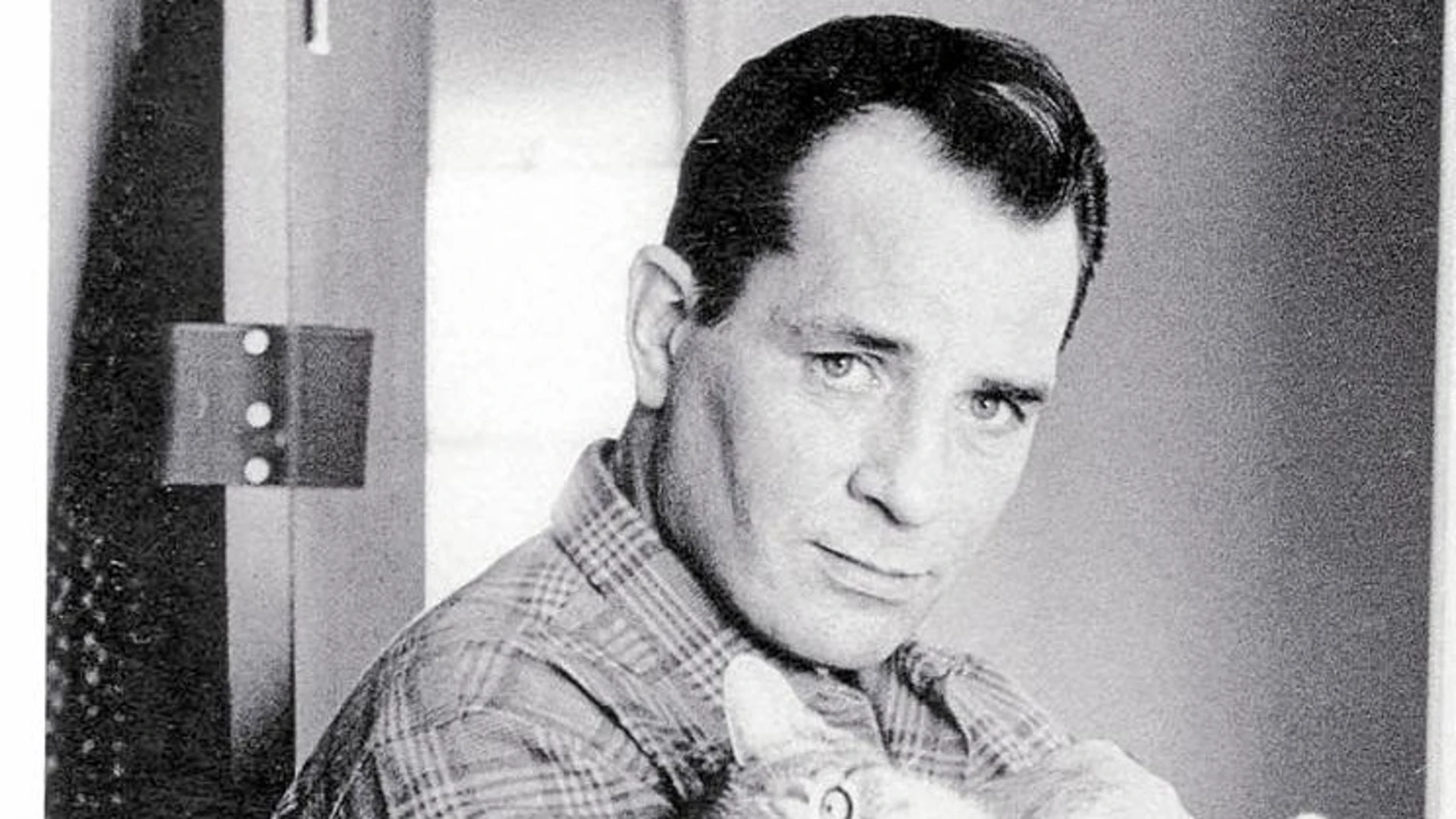 El escritor Jack Kerouac, exponente de la generación Beatm con su gato Tyke