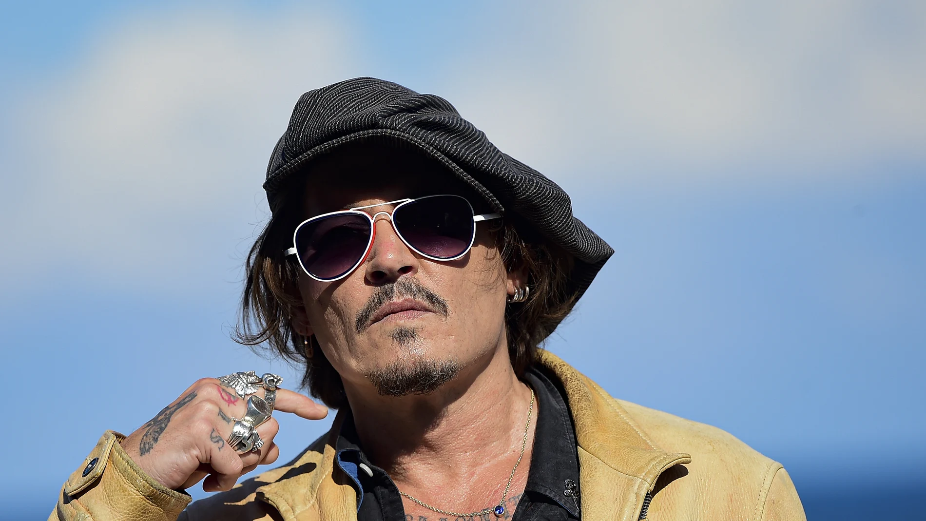 FILE - In this file photo dated Sunday, Sept. 20, 2020, US actor and film producer Johnny Deep during the photocall for his film "Crock of Gold: A Few Rounds with Shane Macgoman" at the 68th San Sebastian Film Festival, in San Sebastian, northern Spain. Appeal judges said the Hollywood star cannot challenge the High Court’s rejection of his libel lawsuit against publisher of The Sun newspaper for labeling him a “wife beater†in an article. High Court Justice Andrew Nicol ruled in November that allegations against Depp, made in a April 2018 article, were “substantially true.†The judges said Thursday that the earlier court hearing was “full and fair†and the justice’s conclusions “have not been shown even arguably to be vitiated by any error of approach or mistake of law.†(AP Photo/Alvaro Barrientos, File)