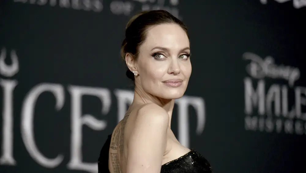 FILE - In this Sept. 30, 2019, file photo, Angelina Jolie arrives at a premiere at the El Capitan Theatre in Los Angeles. Jolie criticized a judge deciding on custody arrangements for her and Brad Pitt's children during their divorce, saying in a court filing on Monday, May 24, 2021, that the judge refused to allow their kids to testify. (Photo by Richard Shotwell/Invision/AP)