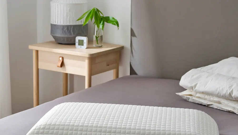 MJÖLKKLOCKAAlmohada ergonómica, de espaldas/lado