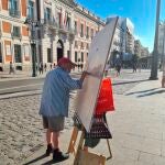 GRAF2460. MADRID, 01/07/2021.- El pintor Antonio López ha vuelto este jueves a la madrileña Puerta del Sol para concluir el cuadro que dejó inacabado hace once años, en una "tarde muy bonita, con buena luz y sin viento". EFE/Soledad Álvarez