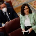 La presidenta de la Comunidad de Madrid, Isabel Díaz Ayuso, interviene en el pleno en la Asamblea de Madrid, este jueves
