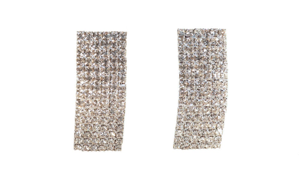 Pendientes con detalles de pedrería, de Acus