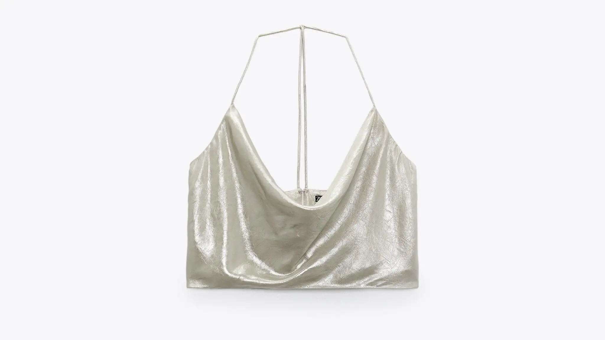 Cuerpo metalizado plateado, de Zara
